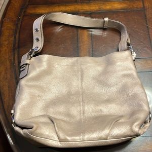 Coach light gold metallic handbag with silver hardware
